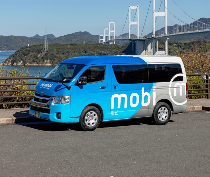 A van with the word mobi on it.