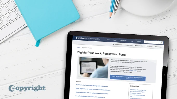 Tablet sits on a desk and displays the Registration Portal webpage. 