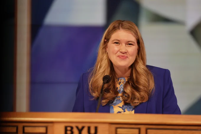 Elysa M. Dishman speaks at a podium for BYU Devotional, June 2026