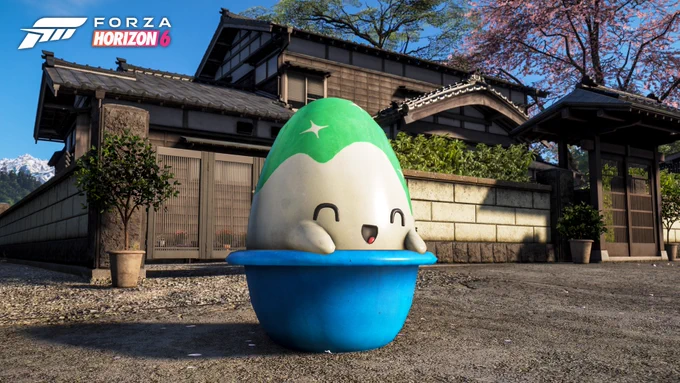A cheerful, cartoonish egg character with a green top half sits in a blue cup in front of a traditional Japanese house with cherry blossoms. In the top left corner, the "Forza Horizon 6" logo is displayed.
