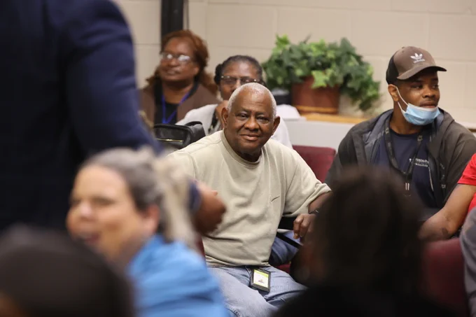 School custodian smiles for camera!