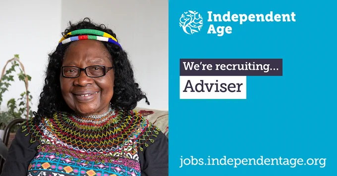 An older Black woman smiles warmly, she wears a colourful traditional necklace and headpiece and has short dark hair. Text reads: We're recruiting... Adviser.