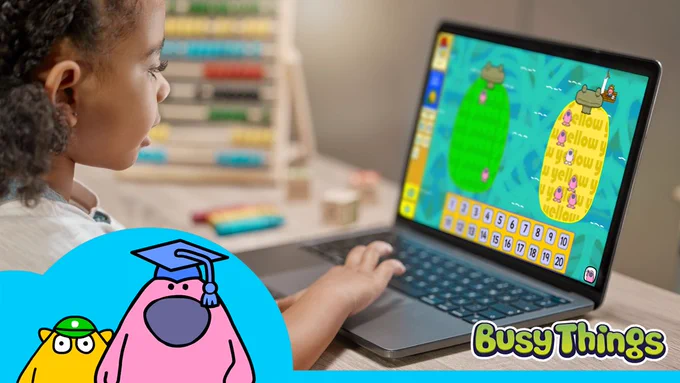 KS1 child playing a maths game confidently on Busy Things