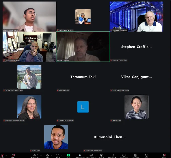 Zoom gallery view from a PhD prospectus defense meeting. The screen shows 14 participants in a grid layout. Some participants have live video on, some use profile photos, and others appear as black tiles with only their names or initials displayed. One participant tile near the center is outlined in green, indicating the active speaker. Most participants appear muted. The Zoom control bar is visible at the bottom of the screen.