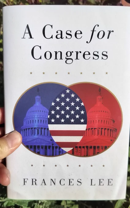 A book cover with red and blue circles overlapping.