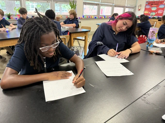 Middle School students working in classroom