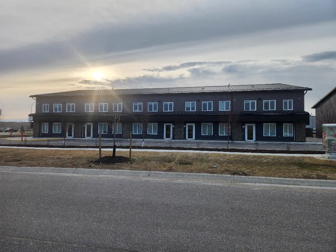 Exterior view of multi-unit commercial MMF building in Winnipeg featuring Hi-Tech installed windows and doors showing long-term durability and performance in Manitoba climate.