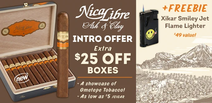 This image is an advertisement for Nica Libre Ash & Clay cigars. It features a box of cigars with one cigar displayed outside the box. Text highlights an intro offer with "$25 off boxes" and mentions Ometepe Tobacco. A free Xikar Smiley Jet Flame Lighter, valued at $49, is also promoted. The background includes an artistic depiction of mountains. - Cigars International