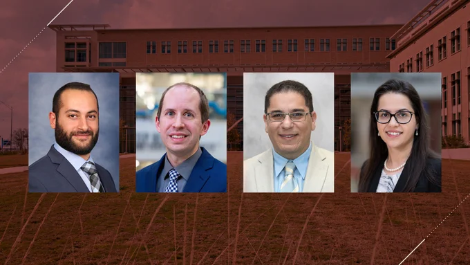 The image shows four individuals in formal attire in front of a building with a cloudy sky.