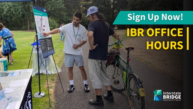 Two people are talking near a display board outdoors during the "Interstate Bridge Replacement Program" event. One is gesturing at the board, while the other stands with a bicycle. A sign reads, "Sign Up Now! IBR Office Hours.
