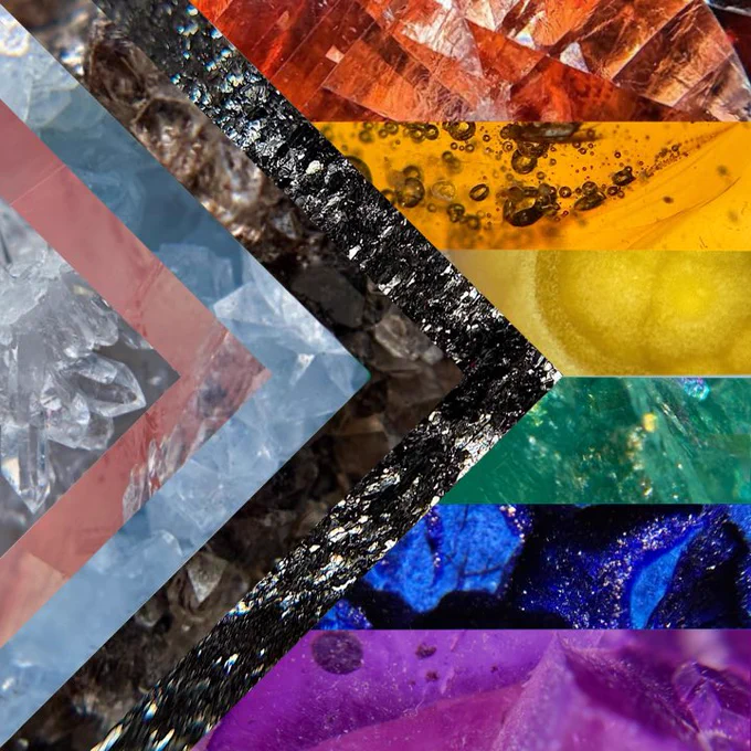 Progress pride flag made from crystal maco photography featuring Quartz, rose quartz, Celestite, smoky quartz, specular hematite, Villiaumite, amber, Coyamito agate, green fluorite, azurite, and purple fluorite