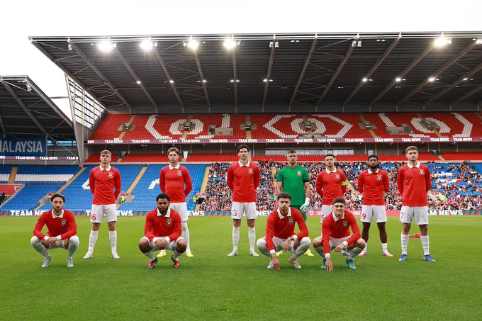 Cymru team line up against Ghana. 
