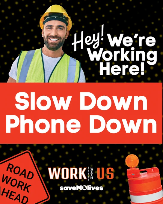 Photo of a highway worker with a construction barrel and "Road Work Ahead" sign.