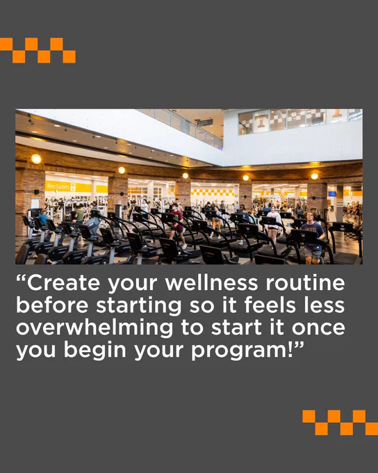 A spacious gym interior featuring rows of exercise equipment, with several people working out. In the background, signs for "Rec Sports" are visible. The image has an overlay text stating, "Create your wellness routine before starting so it feels less overwhelming to start it once you begin your program!" The overall tone is motivational.