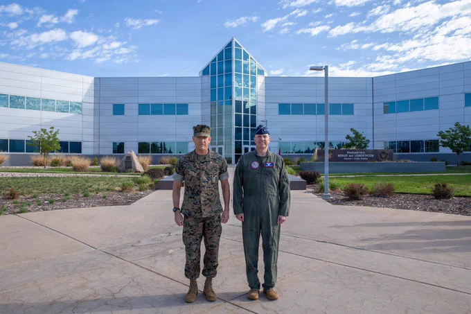 From right, Gen. Gregory Guillot, commander of North American Aeospace Defense Command (NORAD) and U.S. Northern Command (USNORTHCOM) and Gen. Francis Donovan, commander of U.S. Southern Command (USSOUTHCOM) pose for a photo at the commands' headquarters building on Peterson SFB, Colorado, June 1, 2026. During Donovan's visit, USSOUTHCOM and NORAD-USNORTHCOM collaborated to understand and identify mutually beneficial opportunities to improve professional relationships and communication between commands. (Department of War photo by Blake Macias)