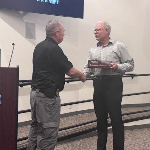 Chief Breshears shakes hands with Sergeant Umbright.