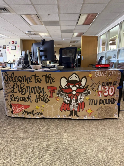 Research hub desk wrap of Raider Red.