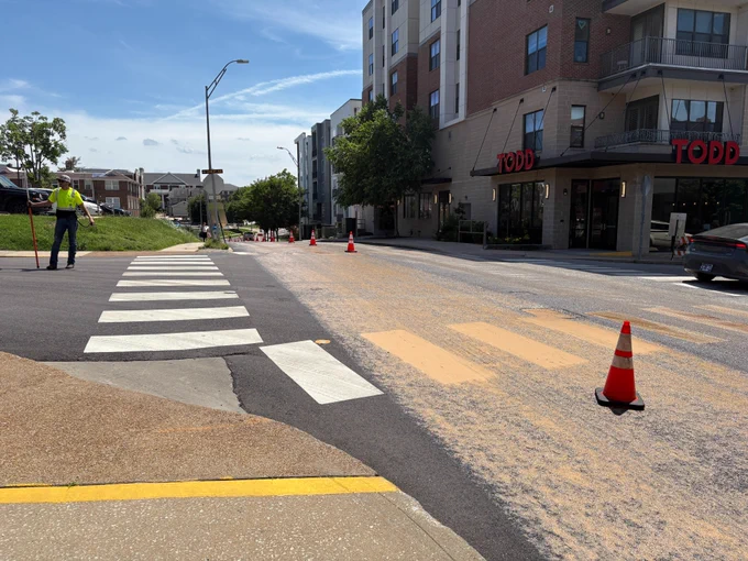 Crews apply Reclamite treatments to South Fifth Street, June 2, 2026.