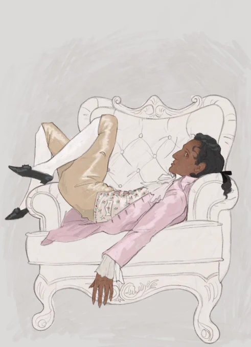 The vampire Armand, a young brown man with long black hair is reclining in a rococo style armchair. He is wearing a pink silk overcoat, beige breeches and an ivory waistcoat with floral embroidery.