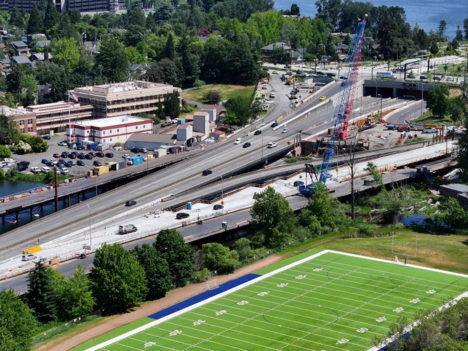 Field int he foreground; new off-ramp and construction in the background