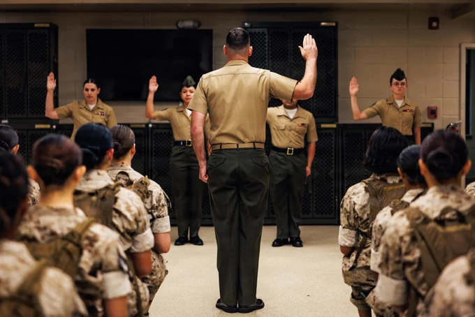 U.S. Marine Corps Maj. Joshua Perras, company commander with Company I, Officer Candidate School, recites the drill instructor creed with sergeant instructors during the Company I pick-up at OCS on Marine Corps Base Quantico, Virginia, May 22, 2026. During pick-up, the candidates meet their sergeant instructors for the first time, who they will be with for their entire training cycle. (U.S. Marine Corps photo by Cpl. Braydon Rogers)\n\n