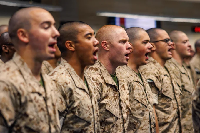 U.S. Marine Corps candidates with Officer Candidate School, Company L, stand at the position during a brief prior to company pick-up day at OCS on Marine Corps Base Quantico, Virginia, May 22, 2026. During pick-up, the candidates meet their sergeant instructors for the first time, who they will be with for their entire training cycle. (U.S. Marine Corps photo by Cpl. Braydon Rogers)\n\n