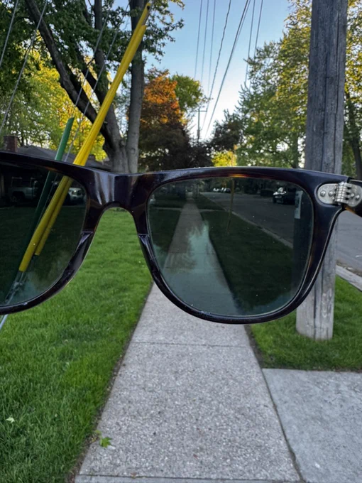 Ray-Ban Wayfarer glasses with a street view