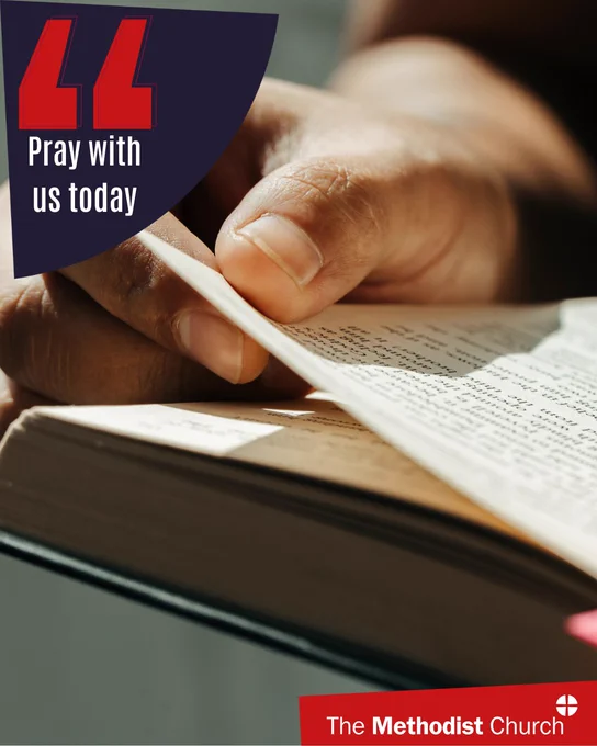 Photo of a hand turning the pages of a book. Methodist logo in the lower right corner and text which reads 'pray with us today' 