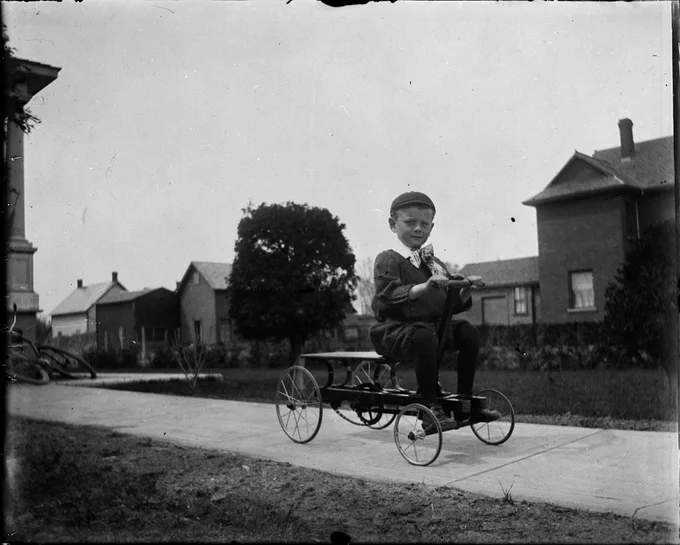 Boy on velocipede, Almonte, Ontario, circa 1910