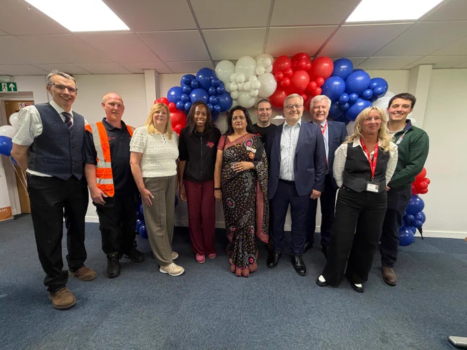 Deputy Lieutenant, Mrs Neelam Aggarwal-Singh MBE JP  seen pictured with Tony Gibbs (CEO SERVE), Lorraine Lewis (CEO The Lewis Foundation), Mikey Kemp (Public Health at West Northants Council) and staff who volunteer at SFS.