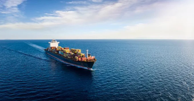 A cargo ship on open water