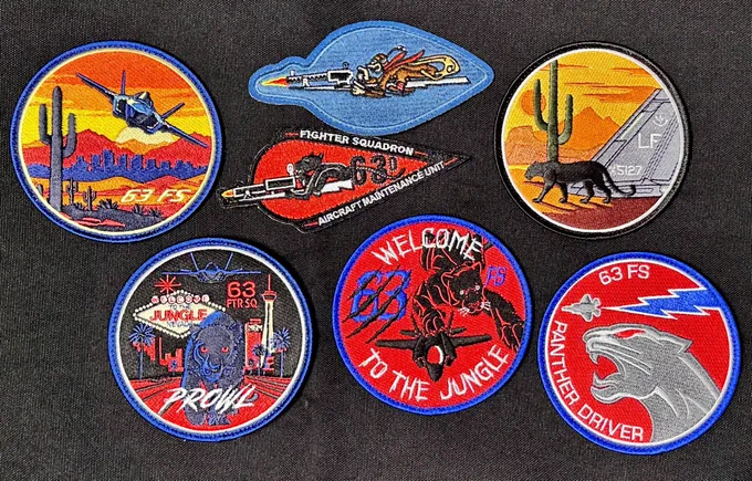 Latest acquisition of the 63rd Fighter Squadron patches. 
Top left: 63FS Arizona cactus 🌵 
Top middle:two different types of the squadron heritage patches 
Top right: Tail number 5127
Bottom left: Red Flag Las Vegas🚩 
Bottom center:Squadron Friday patch “Welcome to the Jungle” 
Bottom right: 63FS Panthers Driver 🐆