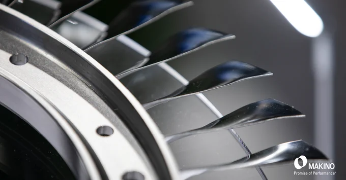 Close-up of a sleek, metallic turbine blade assembly with polished surfaces and precise engineering details produced on a Makino high-performance machining center.

Makino
Promise of Performance