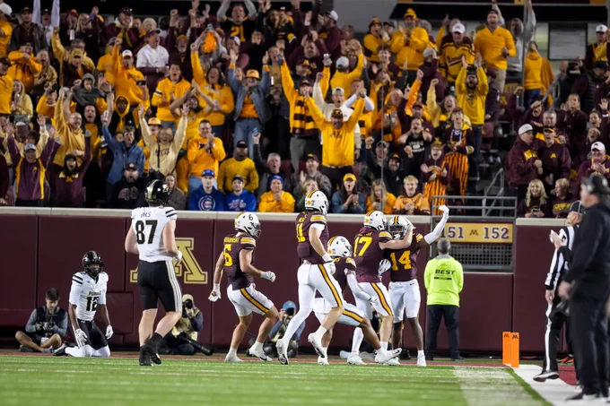 Kerry Brown's interception celebration versus Purdue in 2025 with the crowd in the background. 