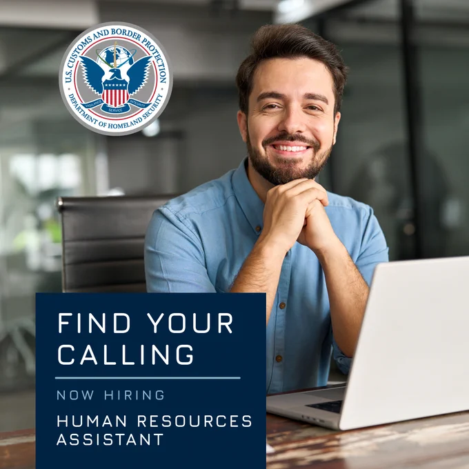 Man in blue shirt at office desk with laptop. Text reads, find your calling. Now hiring Human Resources Assistant.