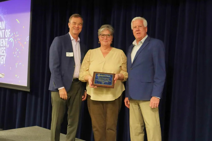 EGLE Director Phil Roos and Cindy Whittum, EGLE’s recruitment and internship specialist, receive the Internship Non-Profit
Employer of the Year award from Troy Farley, director of Grand Valley State University’s Career Center.