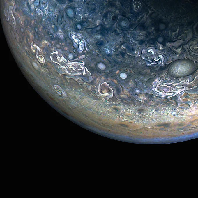 During its 61st close flyby of Jupiter on May 12, 2024, NASA's Juno spacecraft captured this color-enhanced view of chaotic clouds and cyclonic storms in the giant planet's northern hemisphere. Citizen scientist Gary Eason made this image using raw data from the JunoCam instrument, applying digital processing techniques to enhance color and clarity.

Credits: Image data: NASA/JPL-Caltech/SwRI/MSSS, Image processing by Gary Eason © CC BY