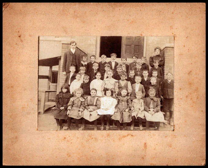 From the Noxubee County Historical Society Lucille M. Reeves Collection. Photograph of students at Macon Grammar School. March 19, 1905.