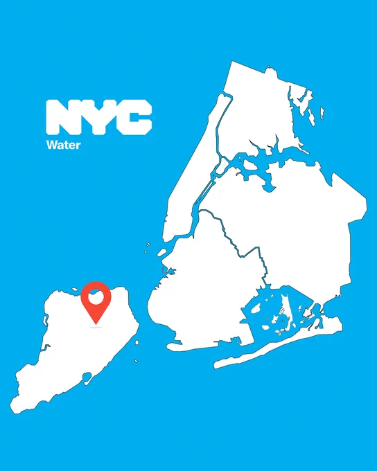 Map of New York City boroughs with a red location pin on Staten Island against a blue background.