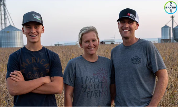 The Mohr family standing in front of their farm.