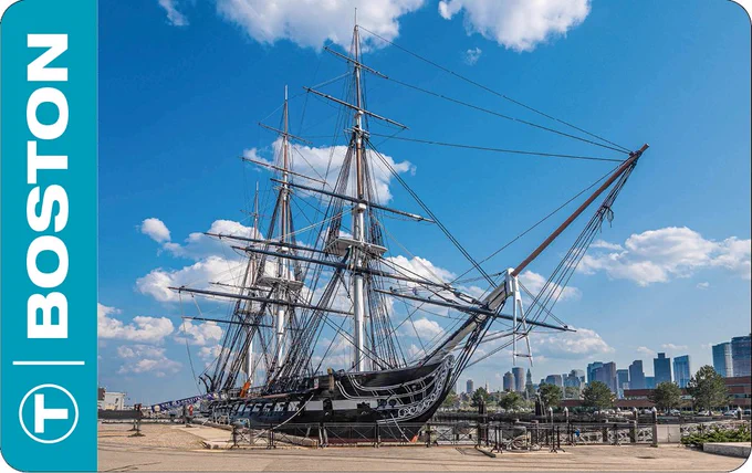 A collectable CharlieCard with the USS Constitution pictured.