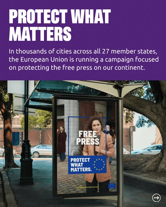 The same Free Press advertisement appears on a street advertising panel beneath trees on a sunny day. A purple banner above carries the heading Protect What Matters and explains that, in thousands of cities across all twenty-seven member states, the European Union is running a campaign focused on protecting the free press on our continent.