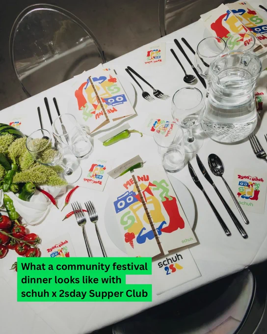 An image of a white table with table settings on it and text overlaying the image saying "What a community festival dinner looks like with schuh x 2sday Supper Club".