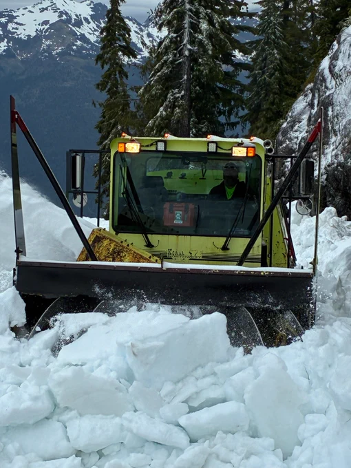 A snowplow works to clear snow from the roadway on SR 542/Mt. Baker Highway on the road to Artist Point.