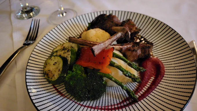 Lamb chops with zucchini, asparagus, broccoli cauliflower, red pepper, garlic mashed potatoes, and a red smear.