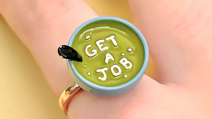 get a job spongebob inspired fidget ring. its a 3D ring of the get a job soup on spongebob and it spins!
