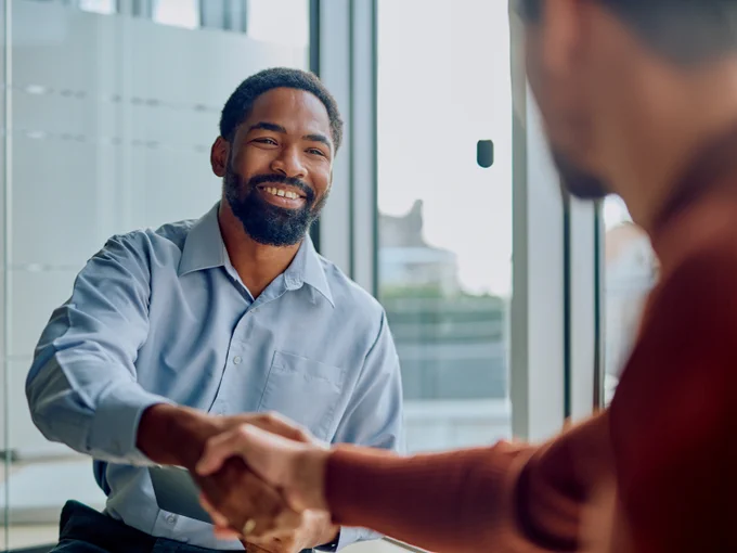 Two businessmen shaking hands