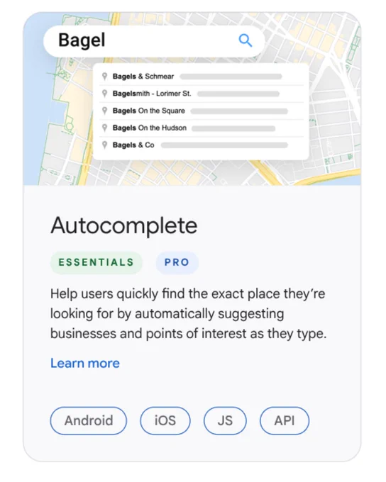 A promotional card for an Autocomplete feature displays a search bar over a map with the word "Bagel" and a dropdown of shop suggestions like "Bagels & Schmear". The card includes descriptions of the feature, "ESSENTIALS" and "PRO" labels, and buttons for Android, iOS, JS, and API platforms.