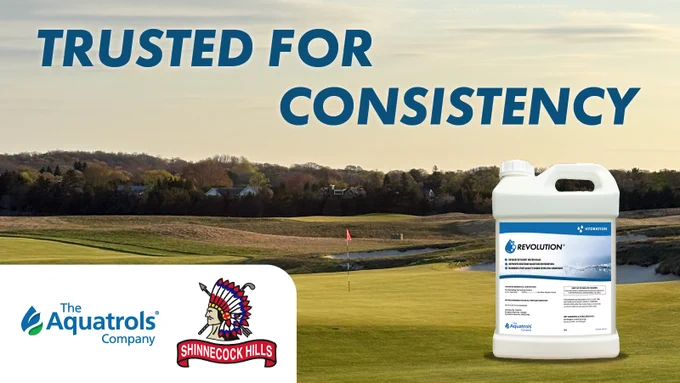 The background features hills and a clear sky behind Shinnecock Hills Golf Club. A jug of Aquatrols Revolution product is in the foreground. "Trusted for Consistency" is written across the top. Logos for The Aquatrols Company and Shinnecock Hills are displayed at the bottom left.