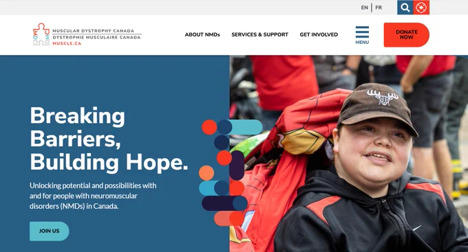 Screenshot of muscle.ca. Person in a wheelchair wearing a red jacket and black cap, participating in an outdoor event supporting neuromuscular disorder awareness.